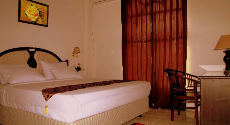 Hotel Mitra Garden Панкалпинанг Номер фото